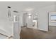 Bright hallway with carpet and access to multiple rooms at 14035 E Sahuaro Dr, Scottsdale, AZ 85259