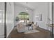 Bright home office with large window and comfortable seating at 14035 E Sahuaro Dr, Scottsdale, AZ 85259
