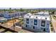 Aerial view of modern townhouses with private parking and surrounding neighborhood at 1642 E Monte Vista Rd # 4, Phoenix, AZ 85006