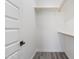 Large closet with wood shelving and a hanging rod at 1642 E Monte Vista Rd # 4, Phoenix, AZ 85006