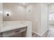 Bright hallway with wood-look flooring and access to bedrooms at 1642 E Monte Vista Rd # 4, Phoenix, AZ 85006