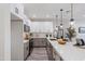 Modern kitchen with gray and white cabinets and a large island at 1642 E Monte Vista Rd # 4, Phoenix, AZ 85006