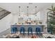 Modern kitchen with white cabinets, quartz countertops and island at 1642 E Monte Vista Rd # 4, Phoenix, AZ 85006