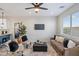 Bright and airy living room with neutral decor and large window at 1642 E Monte Vista Rd # 4, Phoenix, AZ 85006