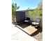 Cozy outdoor patio featuring comfortable seating and stylish privacy screen with integrated planter boxes at 1642 E Monte Vista Rd # 4, Phoenix, AZ 85006