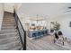 Modern staircase with metal railing leading to the upper level at 1642 E Monte Vista Rd # 4, Phoenix, AZ 85006