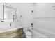 Elegant bathroom featuring white subway tile, marble countertop, and updated bronze fixtures at 19912 E Karsten Dr, Queen Creek, AZ 85142