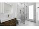 Modern bathroom featuring a glass-enclosed shower, sleek vanity, and stylish fixtures at 19912 E Karsten Dr, Queen Creek, AZ 85142