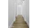 Hallway featuring hardwood floors, neutral walls, and arched doorway at 19912 E Karsten Dr, Queen Creek, AZ 85142