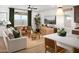 Open concept living room with hardwood floors and neutral decor at 20622 N 226Th Ln, Surprise, AZ 85387