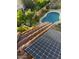 Aerial view of house with pool and solar panels at 23116 N 41St St, Phoenix, AZ 85050