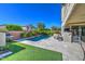 Relaxing backyard oasis with a sparkling pool and spacious patio at 23116 N 41St St, Phoenix, AZ 85050