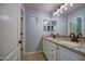 Modern bathroom boasting dual sinks and granite countertops at 23116 N 41St St, Phoenix, AZ 85050