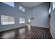 Large dining area with hardwood floors and high ceilings at 23116 N 41St St, Phoenix, AZ 85050