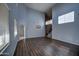 Open dining room with hardwood floors and high ceilings at 23116 N 41St St, Phoenix, AZ 85050