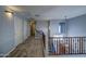 Upstairs hallway with carpet and doors to bedrooms at 23116 N 41St St, Phoenix, AZ 85050