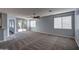 Spacious living room with high ceilings and carpet at 23116 N 41St St, Phoenix, AZ 85050