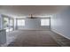 Spacious living room with high ceilings and carpet at 23116 N 41St St, Phoenix, AZ 85050