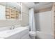 Clean bathroom with tub, shower, and built-in shelves at 2400 N 71St St # T, Scottsdale, AZ 85257