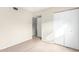 Bedroom with mirrored closet doors and carpet at 2400 N 71St St # T, Scottsdale, AZ 85257