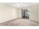 Bedroom with sliding glass door to patio at 2400 N 71St St # T, Scottsdale, AZ 85257