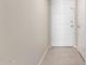 Light-colored entryway with tiled floor and white door at 2400 N 71St St # T, Scottsdale, AZ 85257