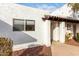 White stucco exterior, private entrance, and landscaping at 2400 N 71St St # T, Scottsdale, AZ 85257