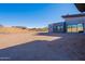 Spacious backyard with desert landscaping and a modern home exterior at 25580 N 119Th St, Scottsdale, AZ 85255