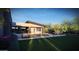 An exterior image of a backyard featuring a pool, patio, landscaping and more at 25580 N 119Th St, Scottsdale, AZ 85255