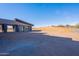 Large backyard with desert landscaping and a modern home exterior at 25580 N 119Th St, Scottsdale, AZ 85255