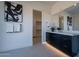 Contemporary bathroom with double vanity and access to a closet at 25580 N 119Th St, Scottsdale, AZ 85255