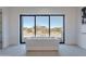 Relaxing bathroom with a freestanding tub and large window at 25580 N 119Th St, Scottsdale, AZ 85255