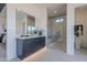 Spa-like bathroom with a walk-in shower and modern vanity at 25580 N 119Th St, Scottsdale, AZ 85255