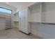 Bright walk-in closet with ample shelving and hanging space at 25580 N 119Th St, Scottsdale, AZ 85255