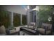 Relaxing courtyard with modern seating, gas fire pit, and climbing plants on a trellis at 25580 N 119Th St, Scottsdale, AZ 85255