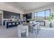 Modern dining area with large windows and patio access at 25580 N 119Th St, Scottsdale, AZ 85255