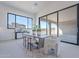 Bright dining room with sliding glass doors to patio at 25580 N 119Th St, Scottsdale, AZ 85255