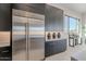 Modern kitchen with stainless steel appliances and ample cabinetry at 25580 N 119Th St, Scottsdale, AZ 85255