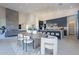 Spacious kitchen with island, stainless steel appliances, and dining area at 25580 N 119Th St, Scottsdale, AZ 85255