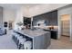 Modern kitchen with large island and dark cabinetry at 25580 N 119Th St, Scottsdale, AZ 85255