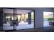 Covered patio with a dining area overlooking the pool at 25580 N 119Th St, Scottsdale, AZ 85255