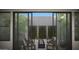 Beautiful patio seating with a modern fire pit and serene landscaping at 25580 N 119Th St, Scottsdale, AZ 85255