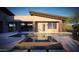 Home exterior featuring a luxurious pool, hot tub, and outdoor dining area at 25580 N 119Th St, Scottsdale, AZ 85255