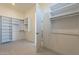Spacious walk-in closet with ample shelving and hanging space at 25580 N 119Th St, Scottsdale, AZ 85255