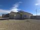 Single story home featuring desert landscaping, a two-car garage, and neutral color palette at 26293 W Desert Crest St, Casa Grande, AZ 85193