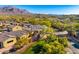 Residential area with Spanish-style homes and mountain backdrop at 3190 S Jacaranda Ct, Gold Canyon, AZ 85118