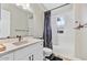 Clean bathroom with white vanity, bathtub, and tile flooring at 3190 S Jacaranda Ct, Gold Canyon, AZ 85118