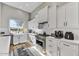 Bright kitchen featuring white cabinets and a center island at 3190 S Jacaranda Ct, Gold Canyon, AZ 85118