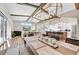 Open concept living room with hardwood floors and wood beams at 3190 S Jacaranda Ct, Gold Canyon, AZ 85118