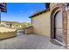 Private patio with brick flooring and a dark brown front door at 3190 S Jacaranda Ct, Gold Canyon, AZ 85118
